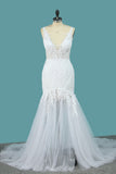 Robes de mariage de sirène de tulle de bretelles de spaghetti de 2024 avec le dos ouvert d&#39;Applique