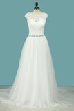 Robes de mariée 2024 Scoop Tulle avec train d&#39;essuie-glaces Applique et Ruffles