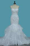 2024 robes de mariée magnifiques bretelles spaghetti sirène / trompette avec bouton couvert